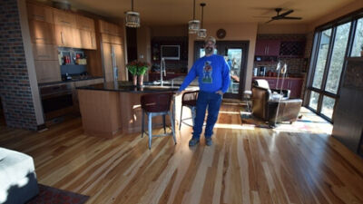 The Sandhages graciously invited John into their home to see their floor after installation.
